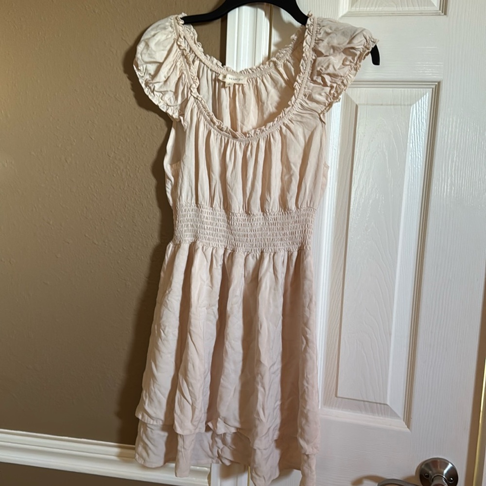 Short sleeves, fun dress. Tan color. Medium.